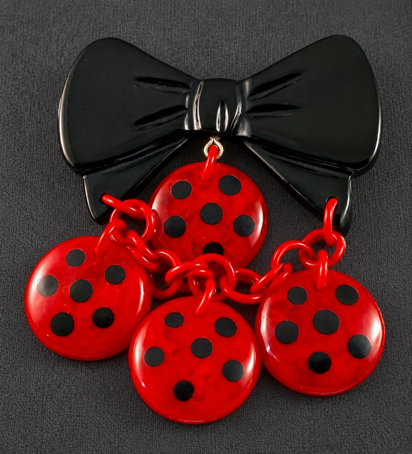 Shultz dotted black & red bow charm pin 